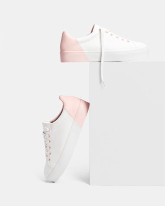 Lace-up sneakers with pink details